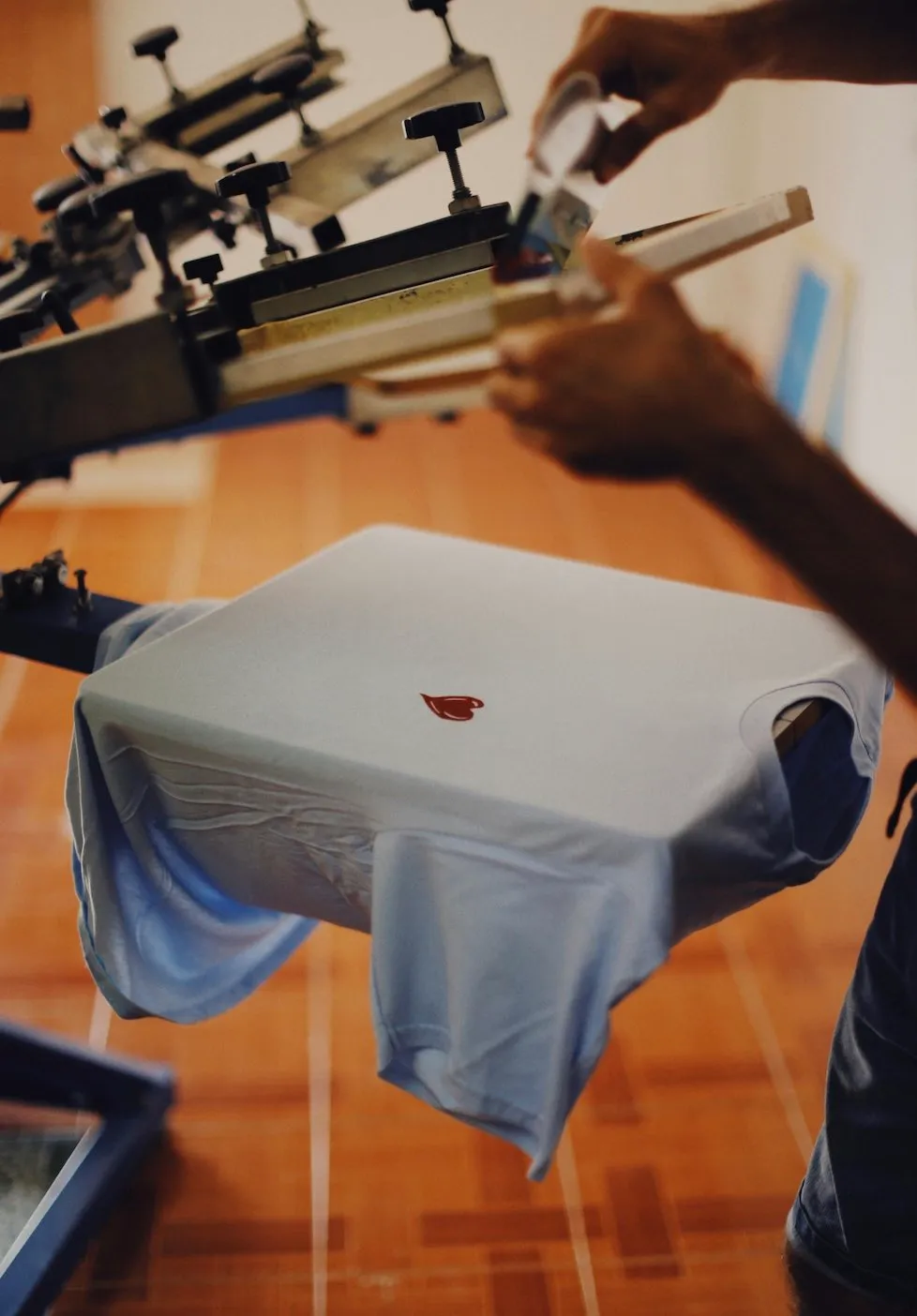 Behind the scenes content example of a t shirt press