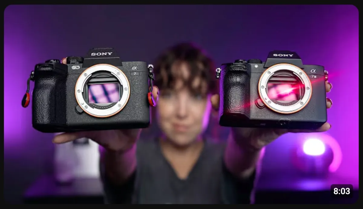 Tech YouTube thumbnail featuring Sony mirrorless cameras with a purple and pink lighting setup